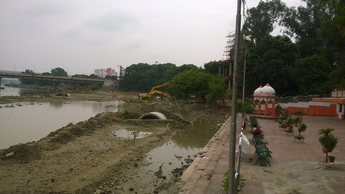 Gomti, Lucknow's lifeline drying from Encroachments and silt image:dredged silt under bridge near ha